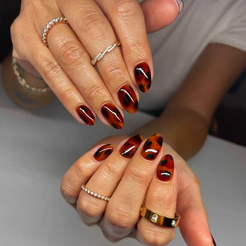 Discover the charm of amber nails with a variety of creative designs, from gel to acrylic styles. Find inspiration for your next manicure.