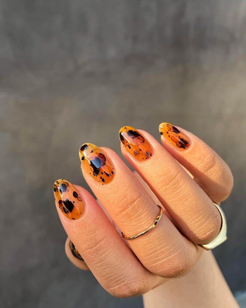 Discover the charm of amber nails with a variety of creative designs, from gel to acrylic styles. Find inspiration for your next manicure.