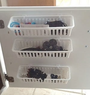 Inside bathroom Cabinet Door basket organization 