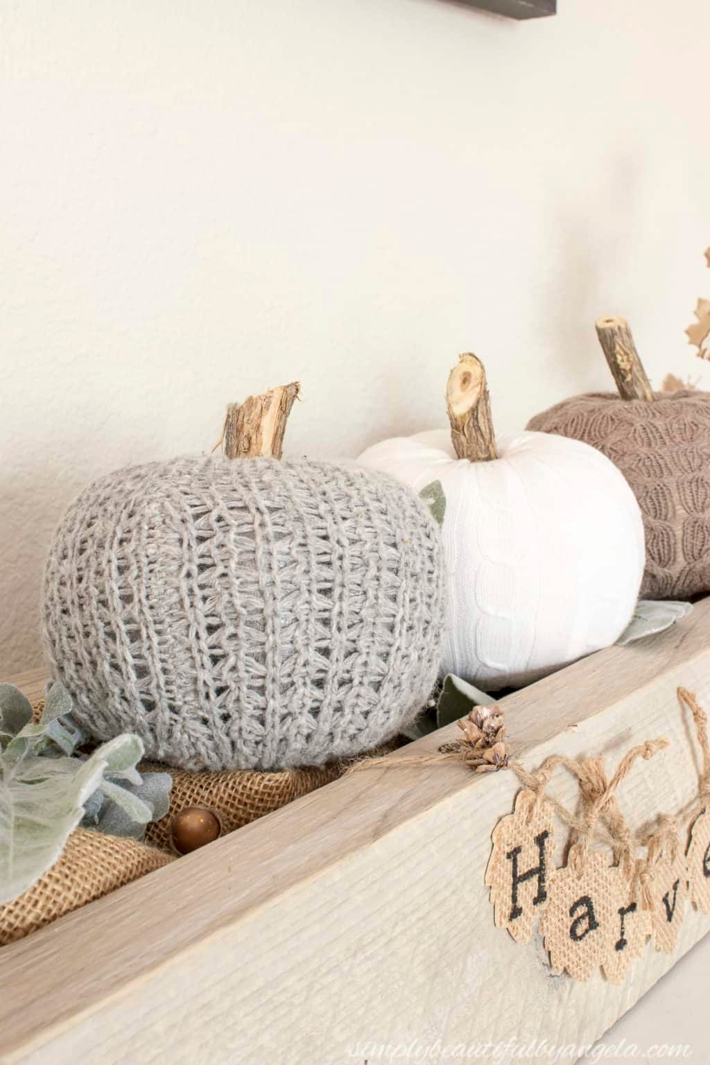 21 Easy Dollar Store Halloween Crafts 11 diy dollar store sweater pumpkins reveal 2