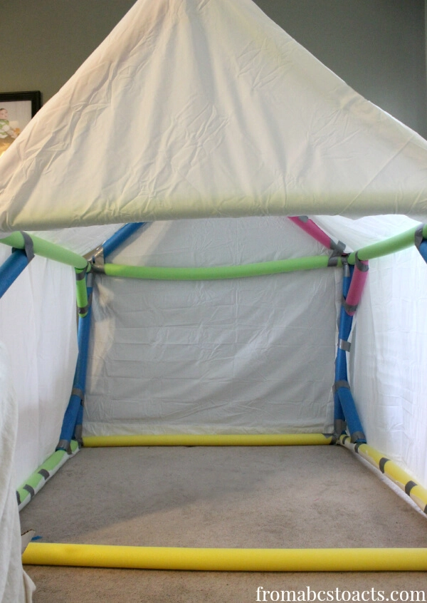 21 Fun Preschool Summer Activities 15 making a play house from pool noodles.jpg