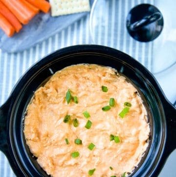 Healthy Buffalo Chicken Dip is a delicious, lighter, no-guilt version of your favorite game-day appetizer! All the flavor of Buffalo Chicken Dip but a skinny version! #buffalochicken #buffalochickendip #dip #appetizer #gamedayappetizer #crockpot #slowcooker