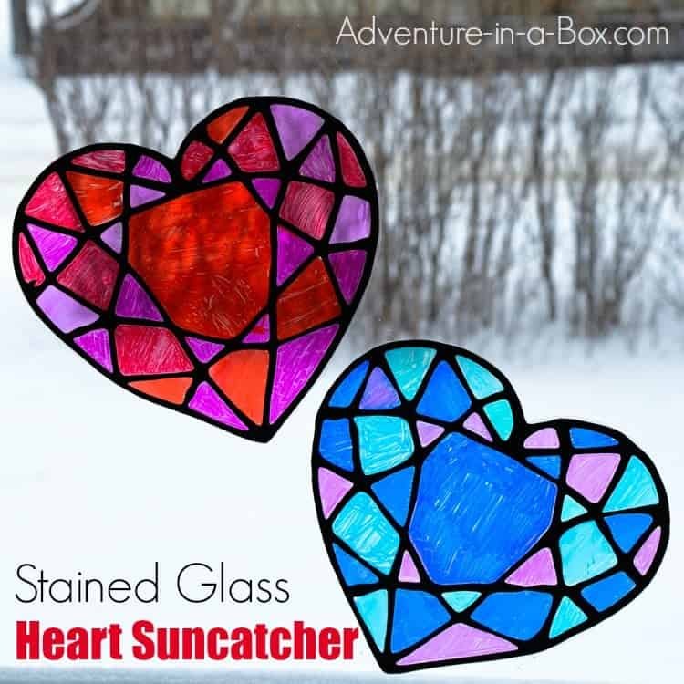 21 Fun Preschool Valentines Day Activities for Kids 8 stained glass heart suncatchers black glue craft fb